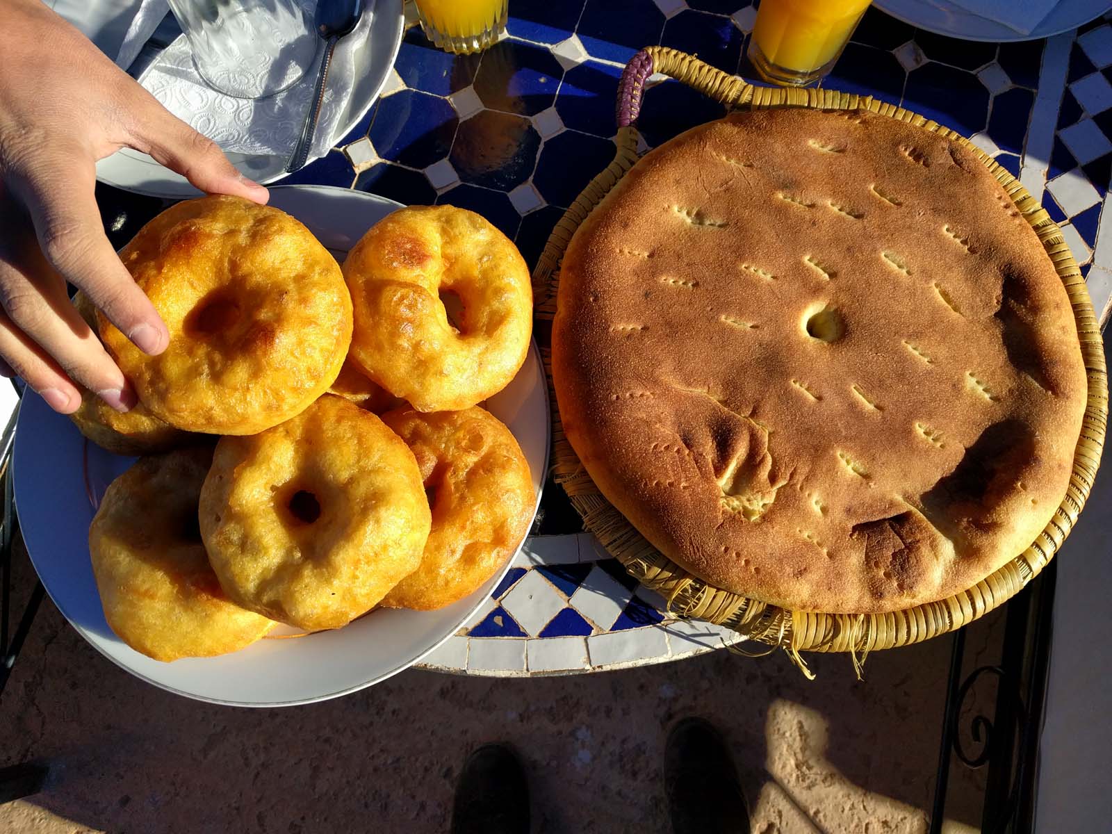 Breakfast with homemade donuts and bread