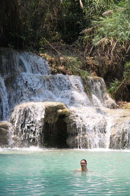 Marianna swims in a natural pool of Kuang Si in Laos