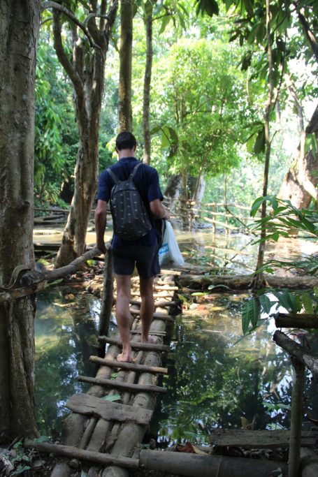 Little wooden bridges on top of Kuang Si waterfalls in Laos