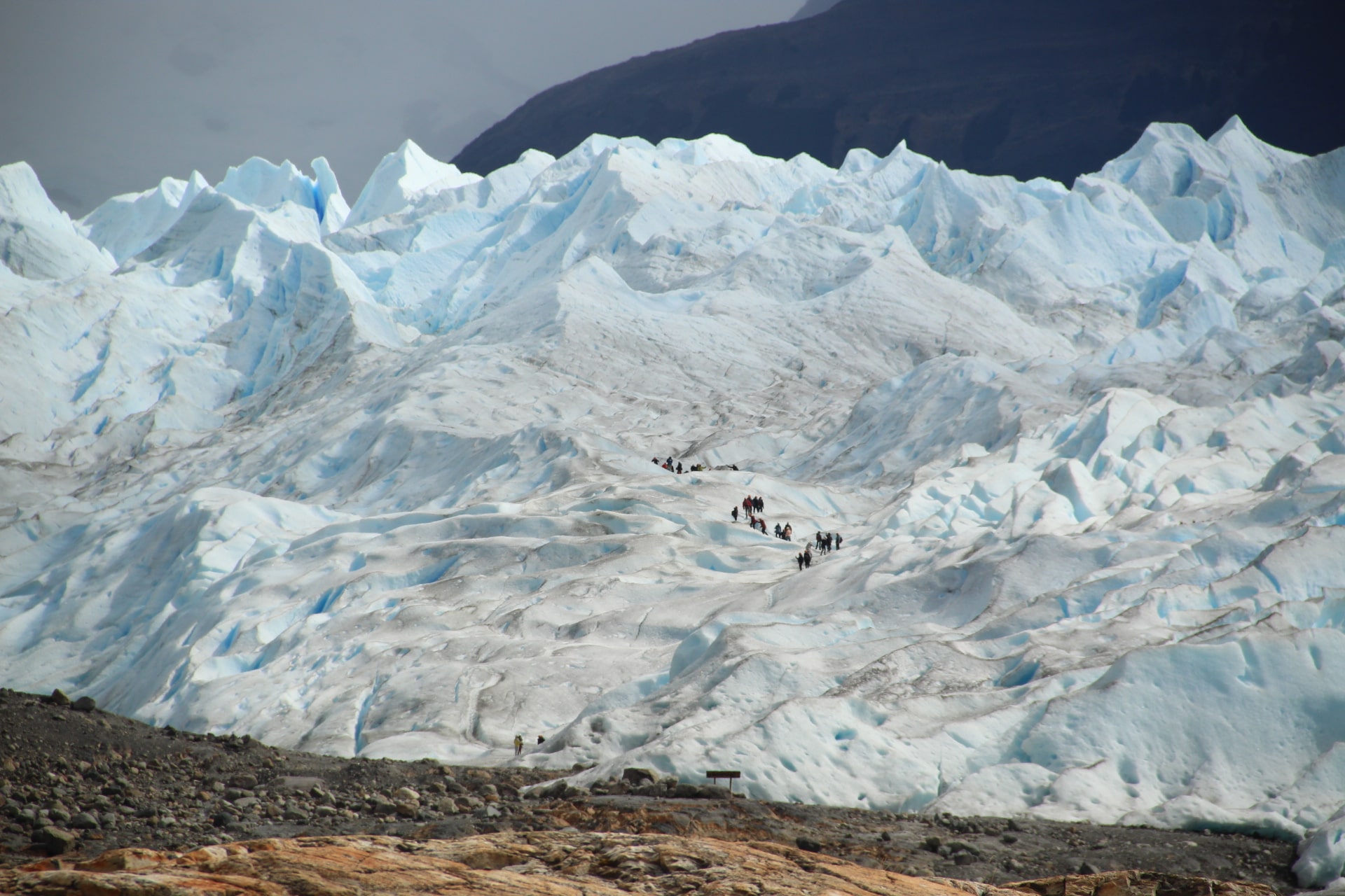 People hiking in Perito Moreno glacier