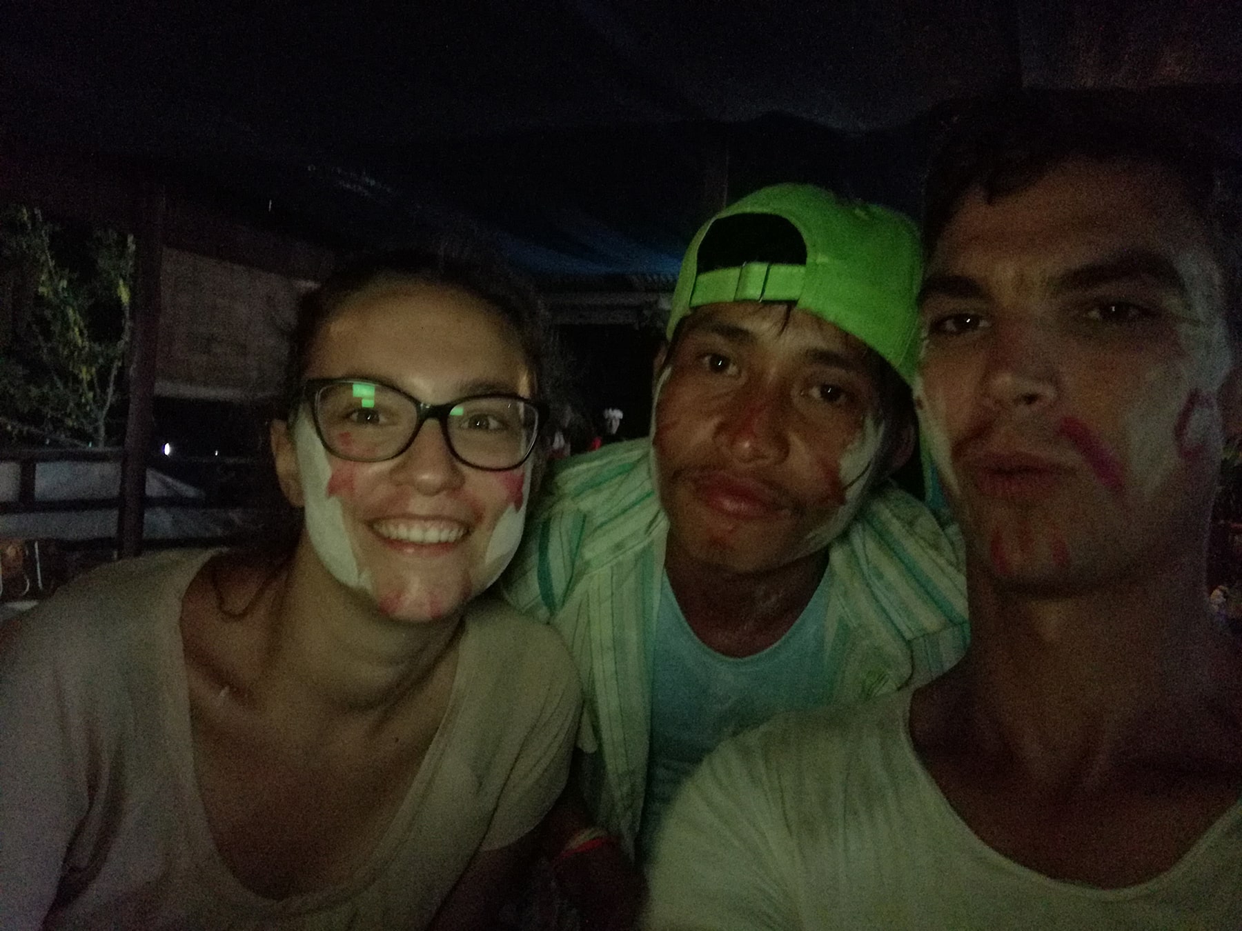 Celebrating with a Laotian guy at Sabaidee Guesthouse, Laos